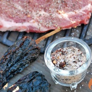 jar of rub next to raw steak