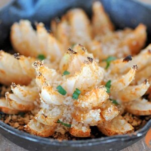 grilled blooming onion in a mini cast iron skillet