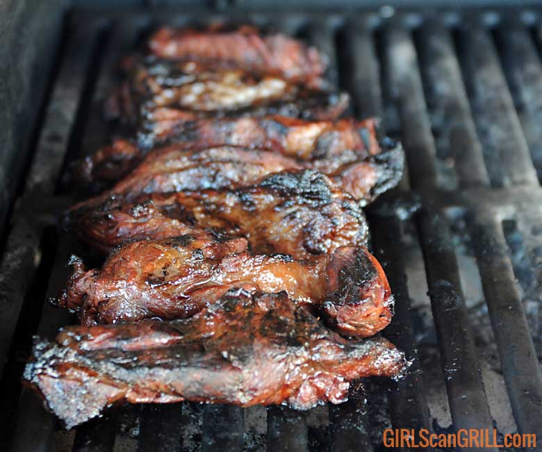 boneless juicy beef ribs on grill