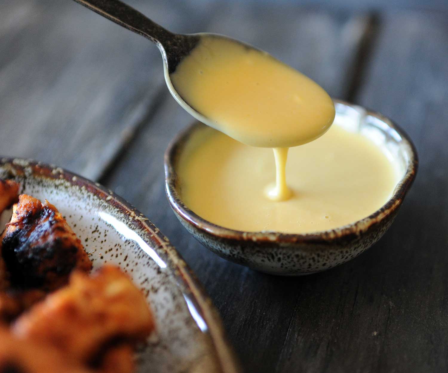 spoon with honey mustard dipping sauce