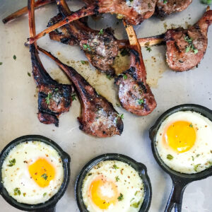 Grilled lamb chops and fried eggs.