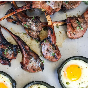 Grilled lamb chops and fried eggs.