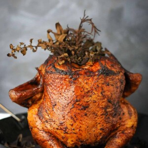 Smoked chicken stuffed with herbs.