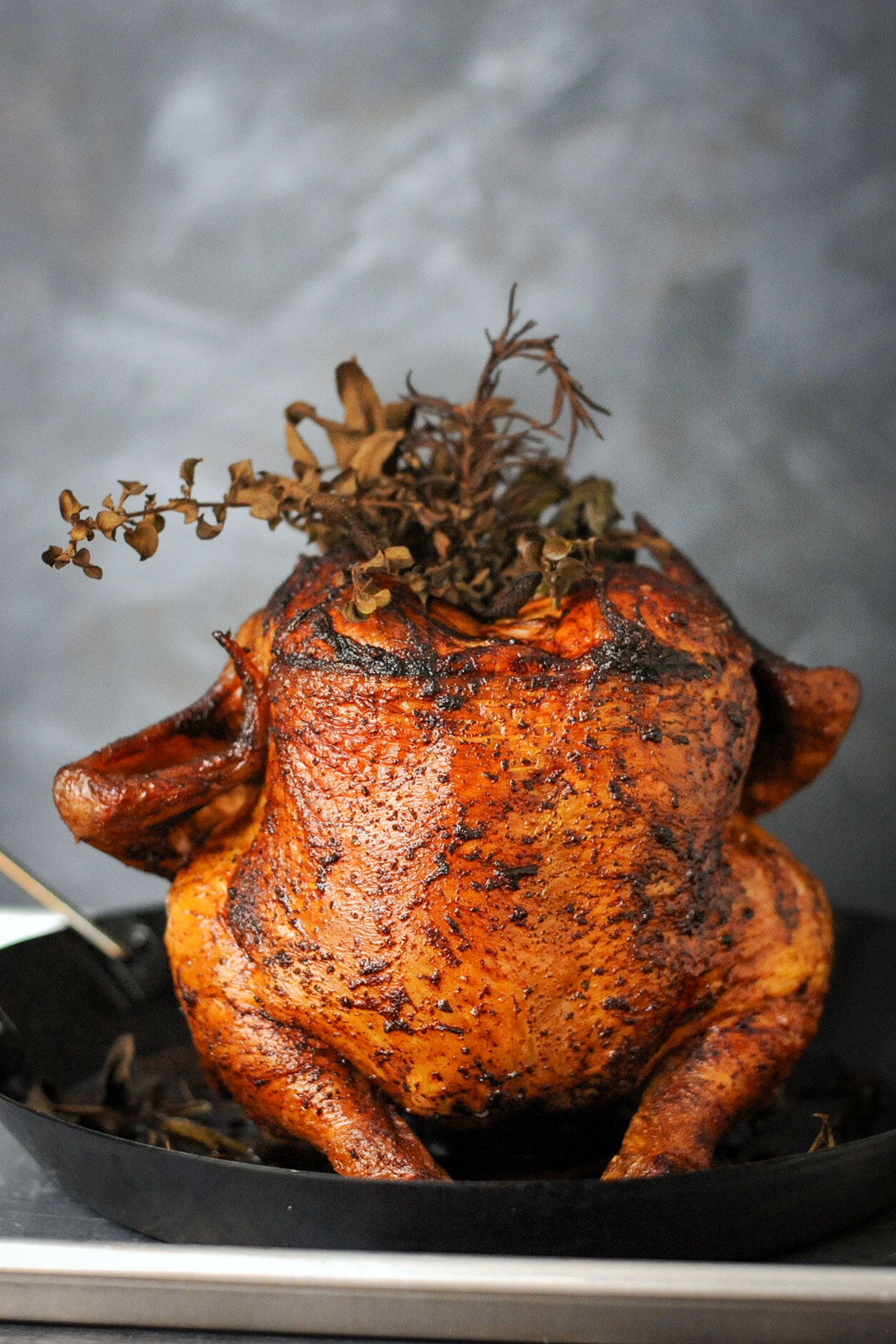 Smoked chicken stuffed with herbs. 