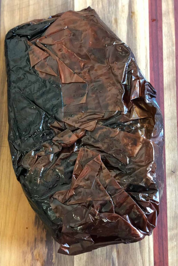 smoked brisket wrapped in butcher paper