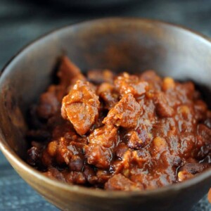 wooden bowl full of meaty chili