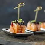 cube of grilled salmon with bourbon glaze.