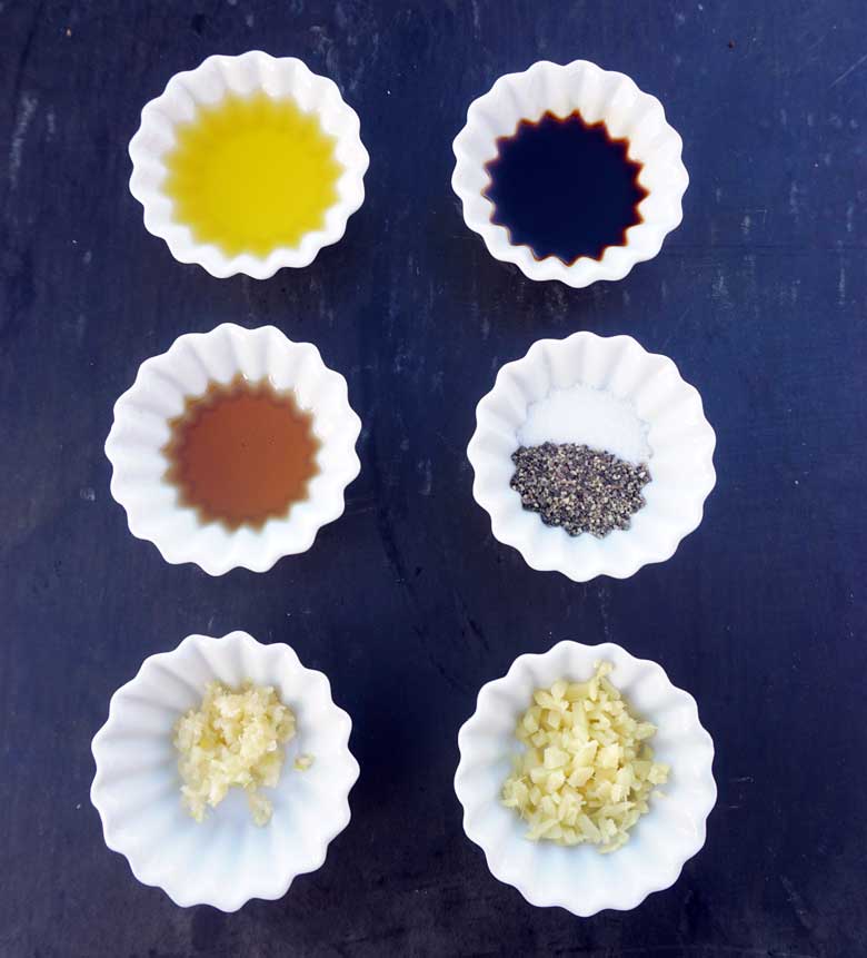 6 white bowls with oils and spices
