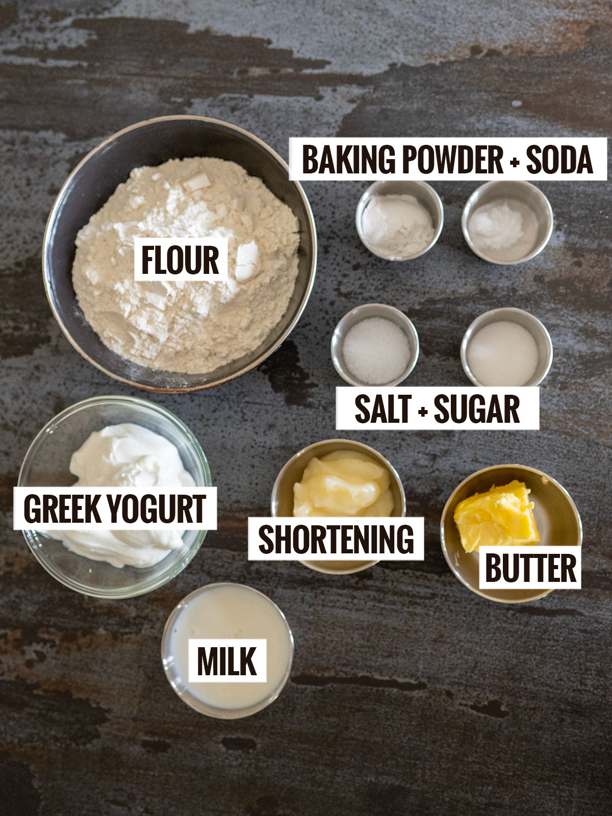 biscuit ingredients: flour, baking powder and soda, salt, sugar, Greek yogurt, milk, shortening, butter.