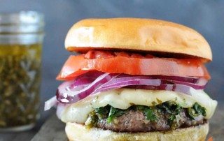 burger with tomato, red onion, white cheese and chimichurri sauce