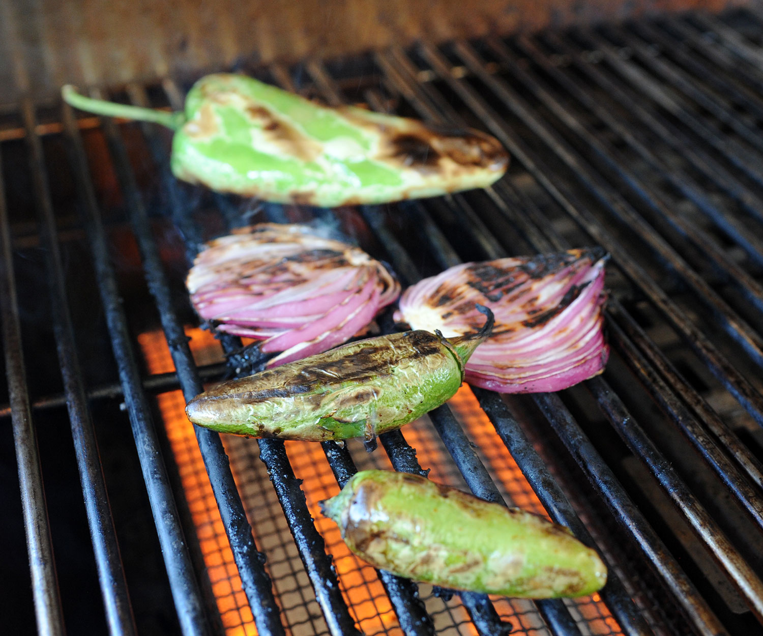 peppers and onions grilling.