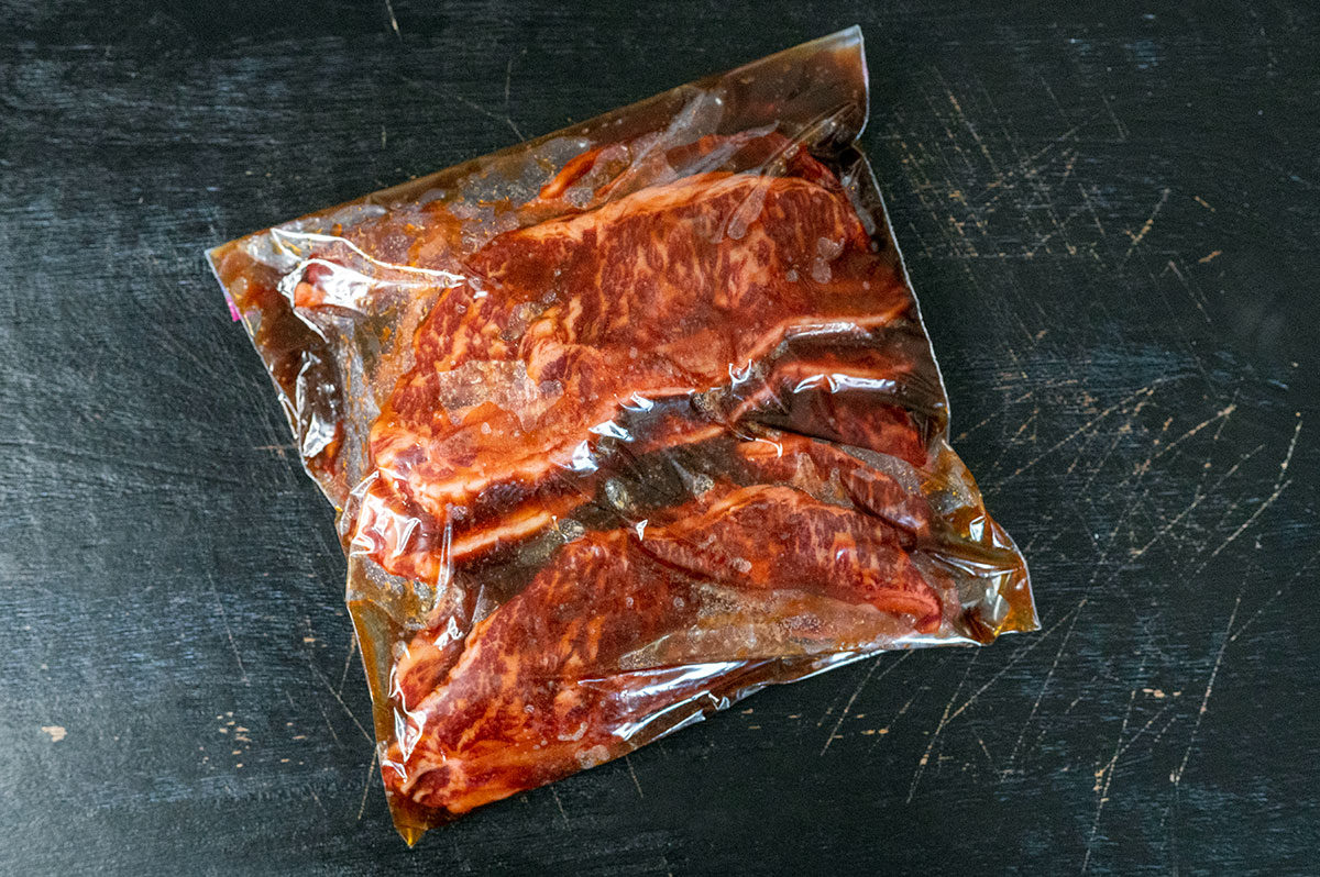 Korean short ribs marinating in bag.