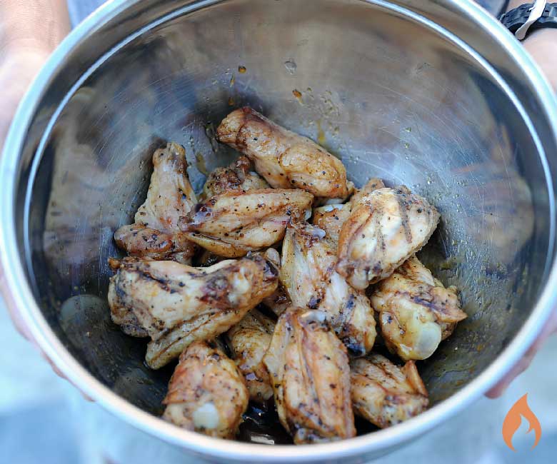 wings in a bowl of sauce