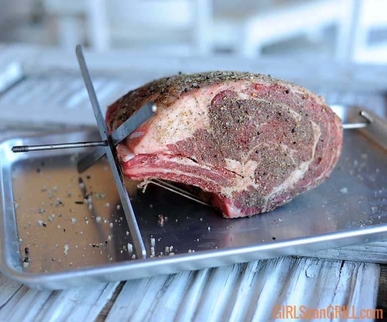 seasoned prime rib roast with EZ-loader inserted through center