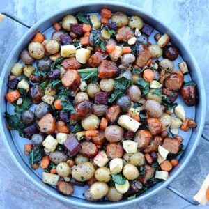 Overhead photo of roasted root vegetables on a round platter