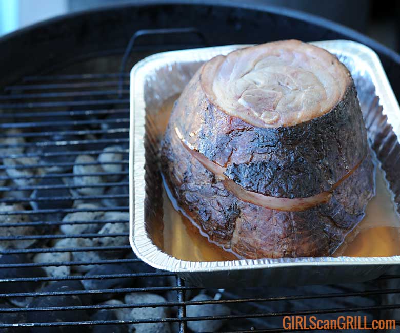 pre-cooked ham on grill in pan