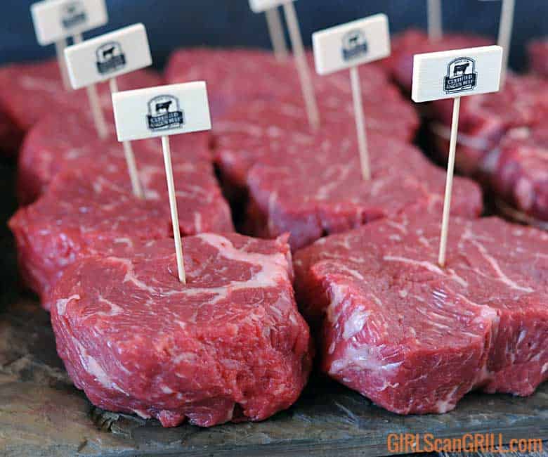 rows of ribeye cap steaks with toothpics