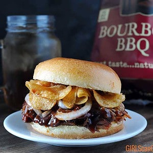 pulled pork sandwich with chips on top