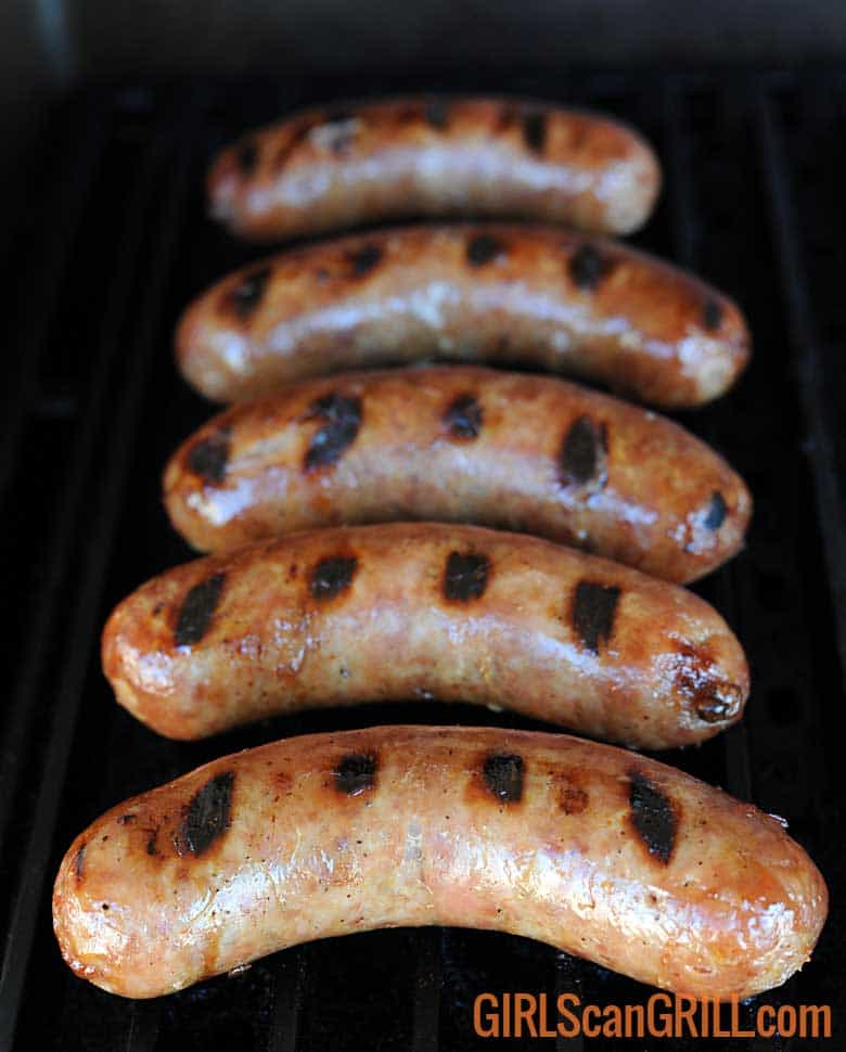 bratwursts on a grill with grill marks