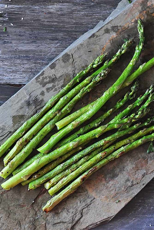 grilled asparagus on slate.