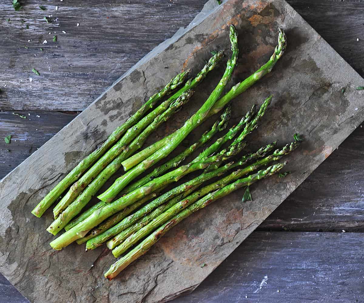 grilled asparagus on slate.