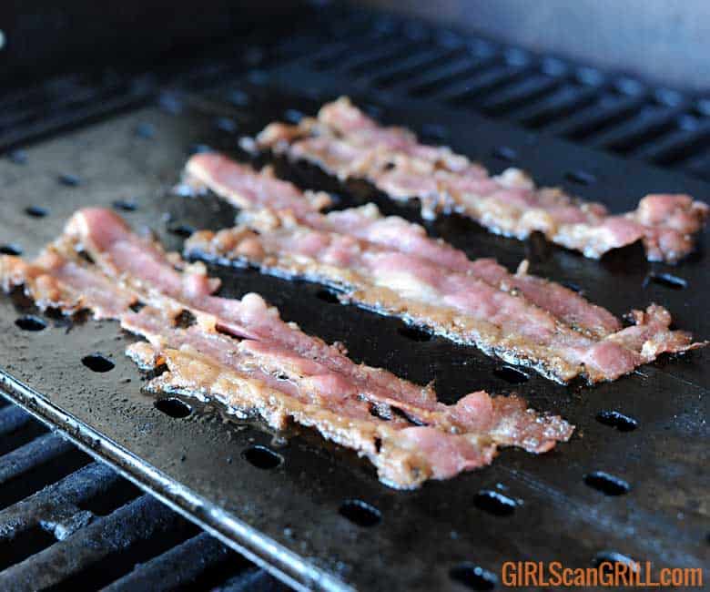 3 strips beef bacon sizzling