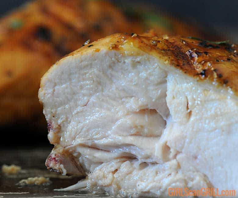 close up shot of sliced chicken breast showing juiciness