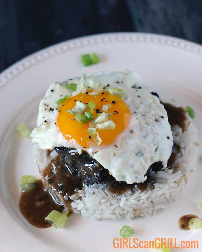 loco moco with egg on top of beef, gravy and rice