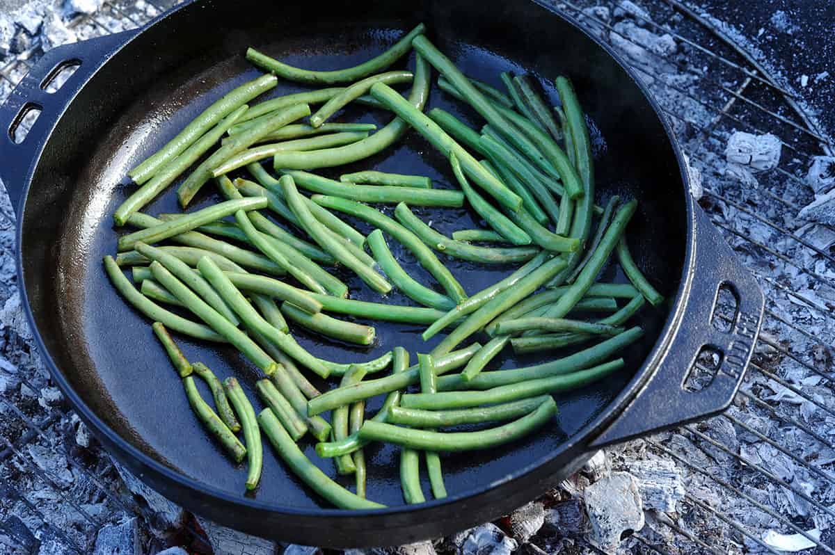 fresh green beans in wok.