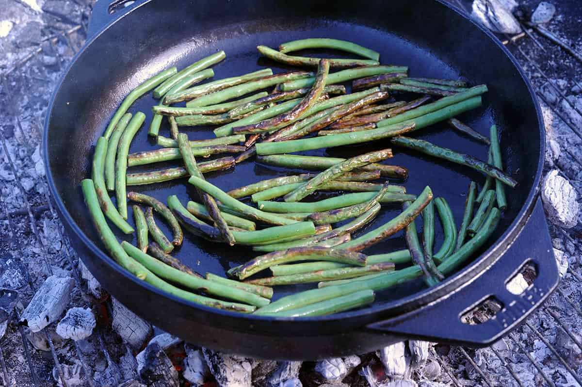 green beans starting to blister in wok.