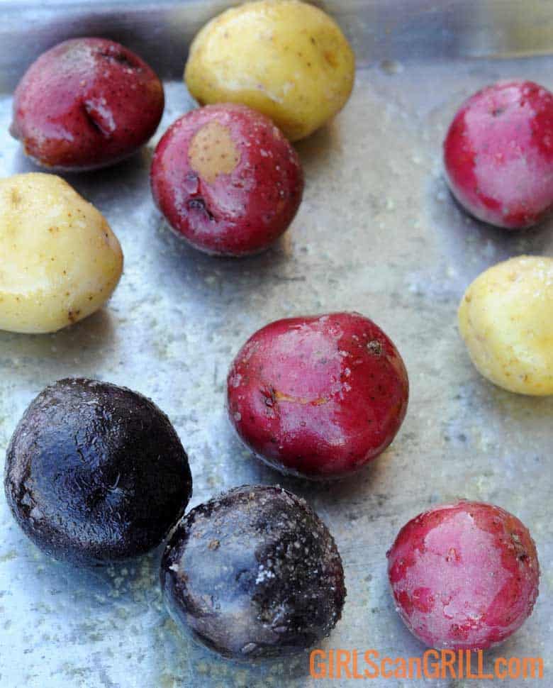seasoned small potatoes on pan