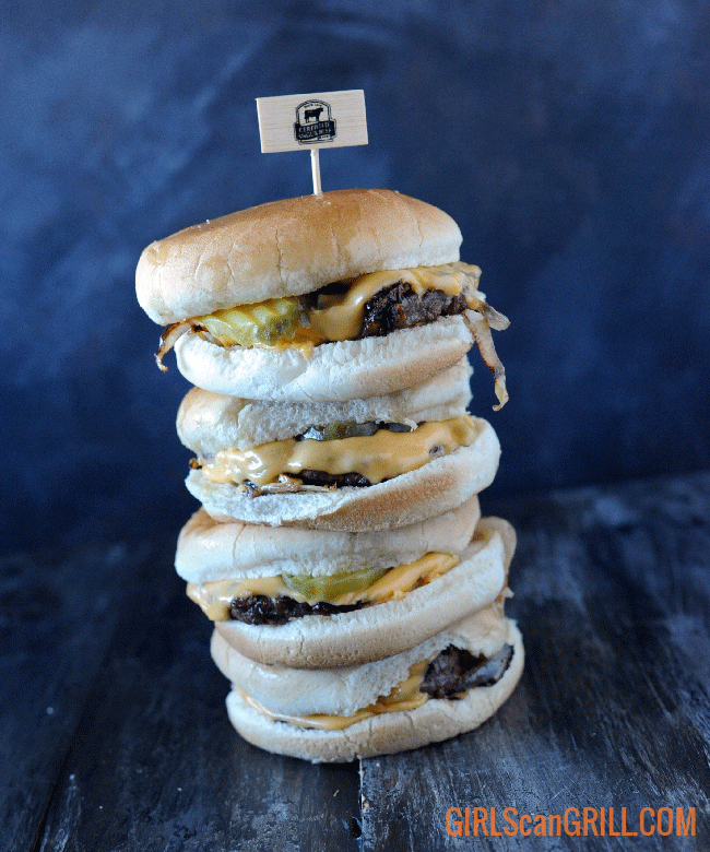 stack of four cheeseburgers