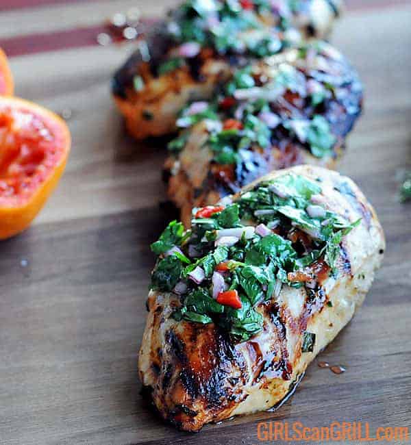 grilled chicken breast topped with fresh green chimichurri