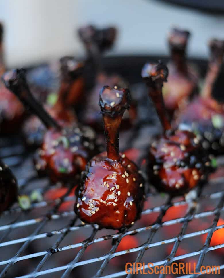 Asian Sticky Chicken cooking on grill grate