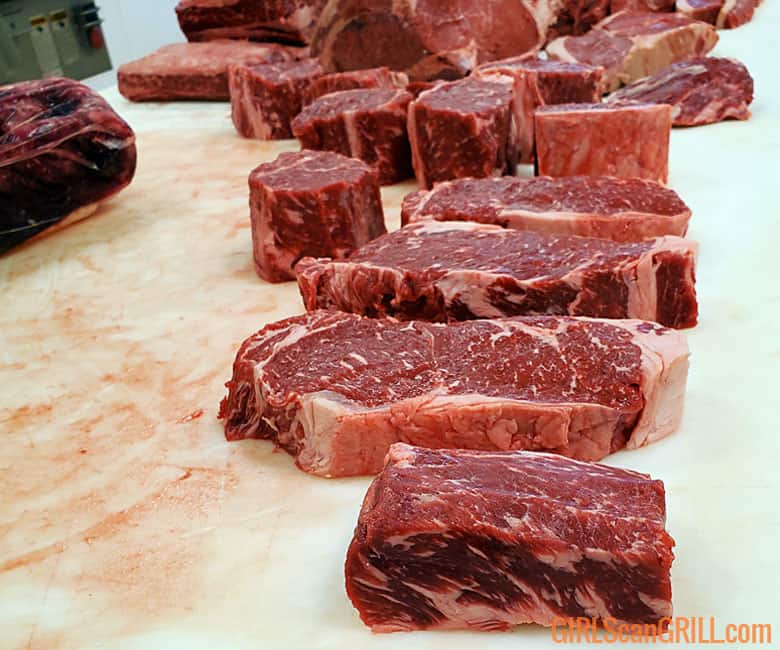 cuts of beef on a counter
