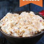 pimento cheese in dark wood bowl
