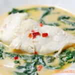 cod in coconut milk broth with spinach and fresno peppers