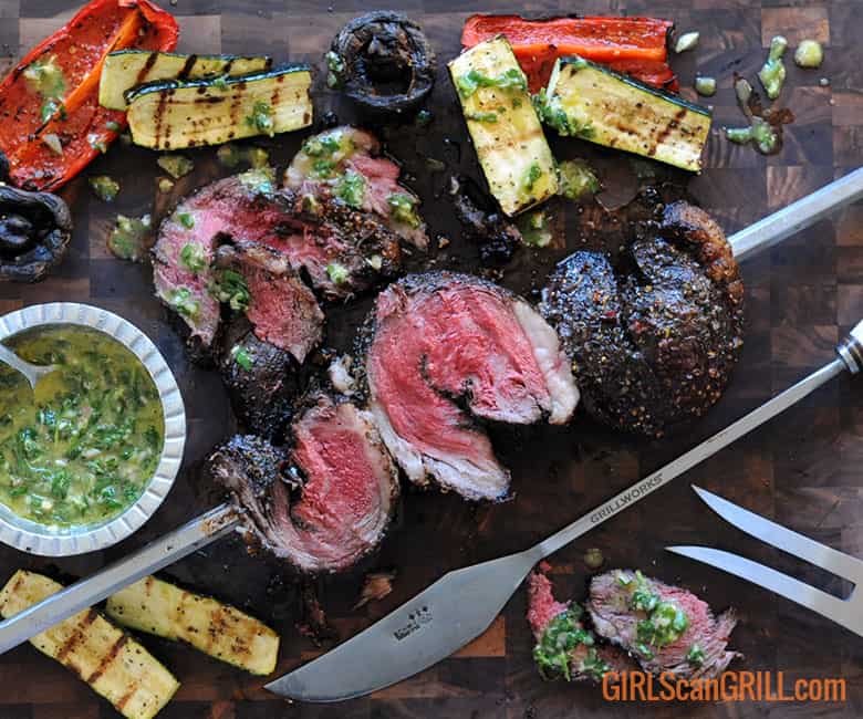 sliced picanha surrounded by grilled veggies