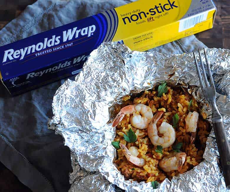 foil packet with cooked seafood paella