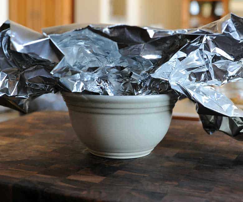 two sheets of foil inside bowl