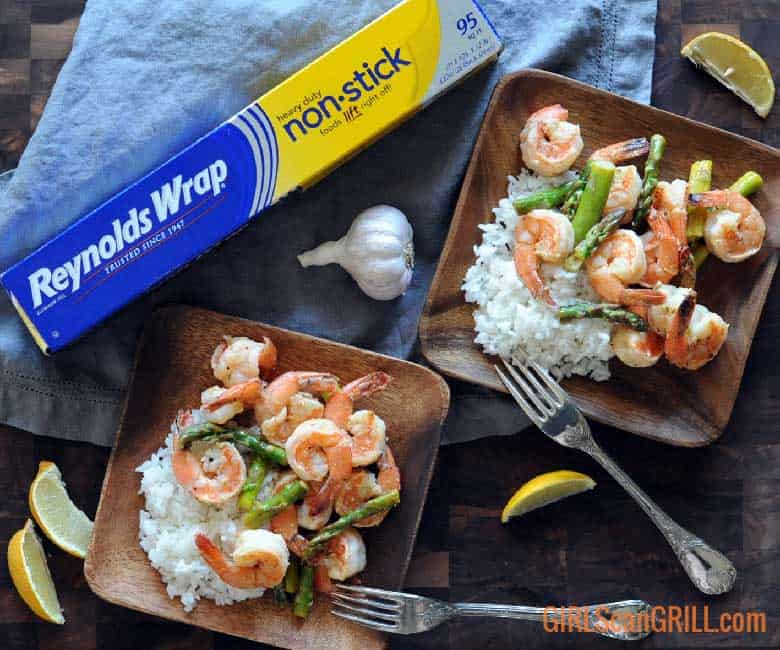 Lemon Garlic Butter Grilled Shrimp and Asparagus with box of Reynolds Wrap® Non-Stick Aluminum Foil