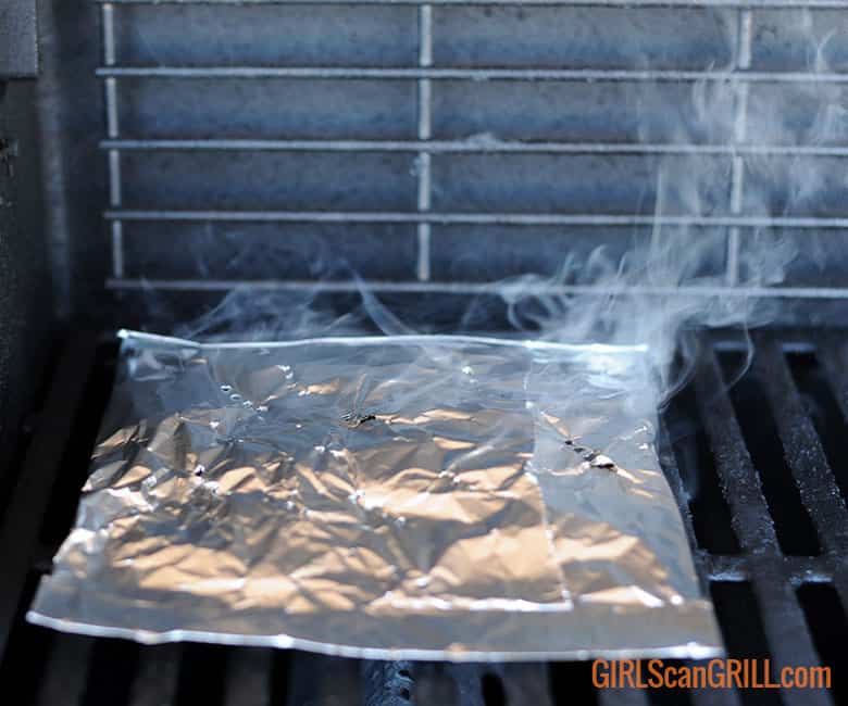 Pellet foil pouch smoking on grill.