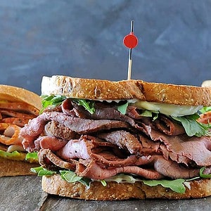 smoked homemade lunch meat - roast beef sandwich with lettuce