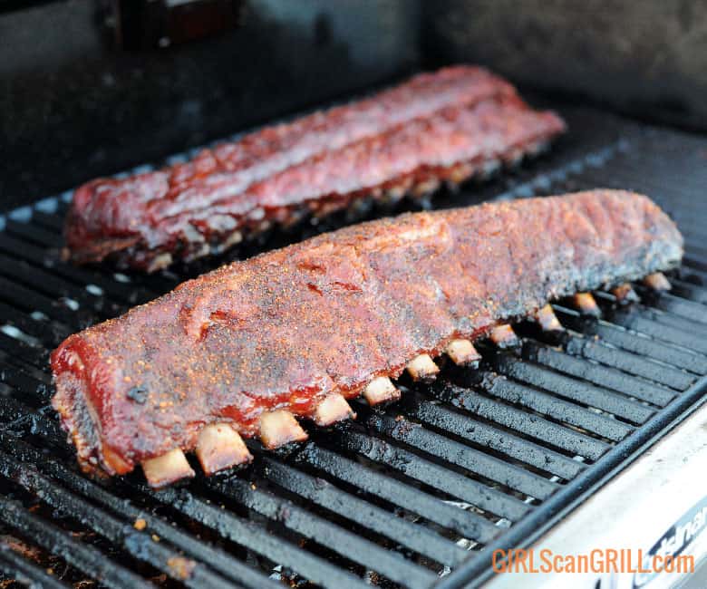 2 racks of baby back ribs on a pellet grill