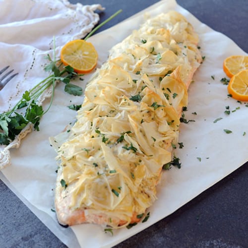 crispy grilled salmon on parchment paper