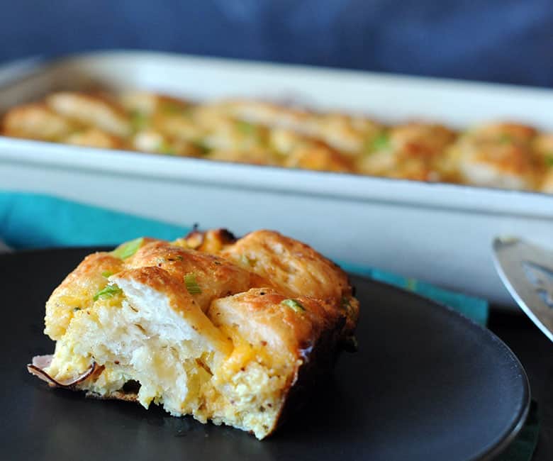 slice of ham and biscuit strata.