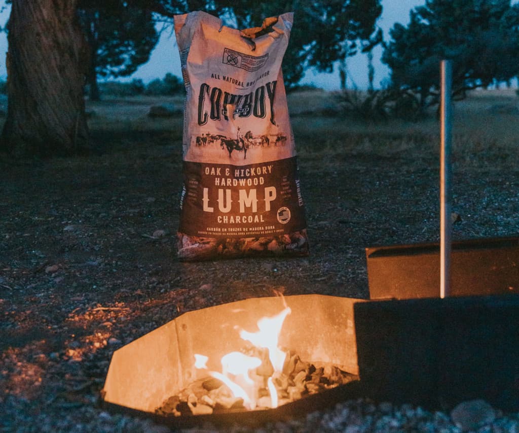 Fire pit burning with Cowboy lump charcoal.