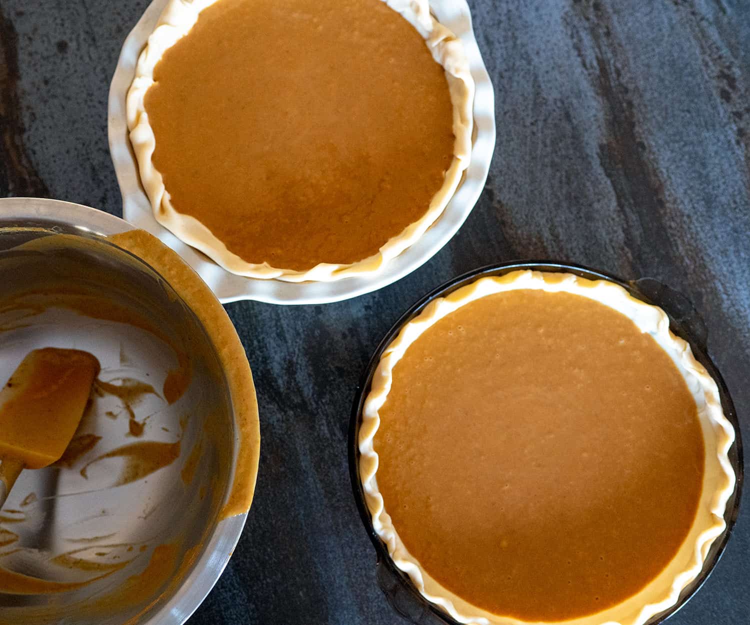 pies filled with pumpkin pie filling.