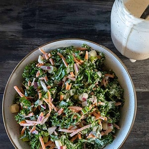 overhead view of kale slaw and Alabama white sauce