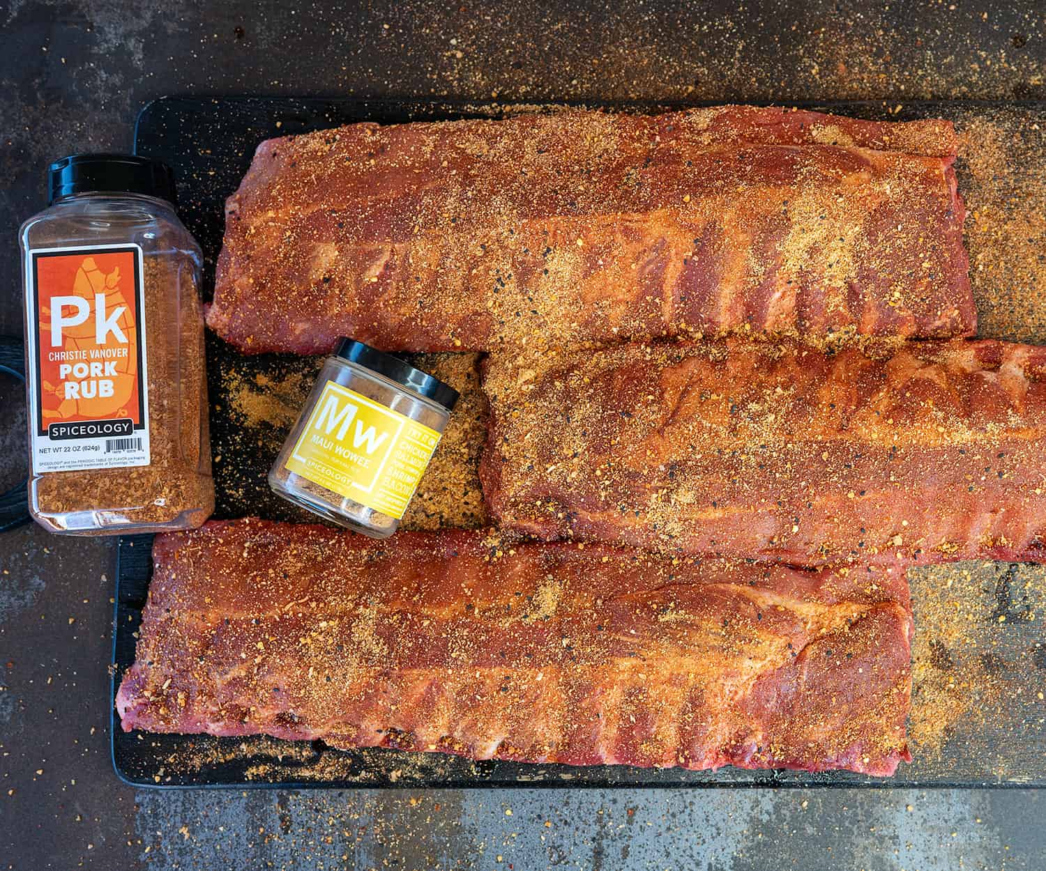 3 racks of pork ribs rubbed with spice